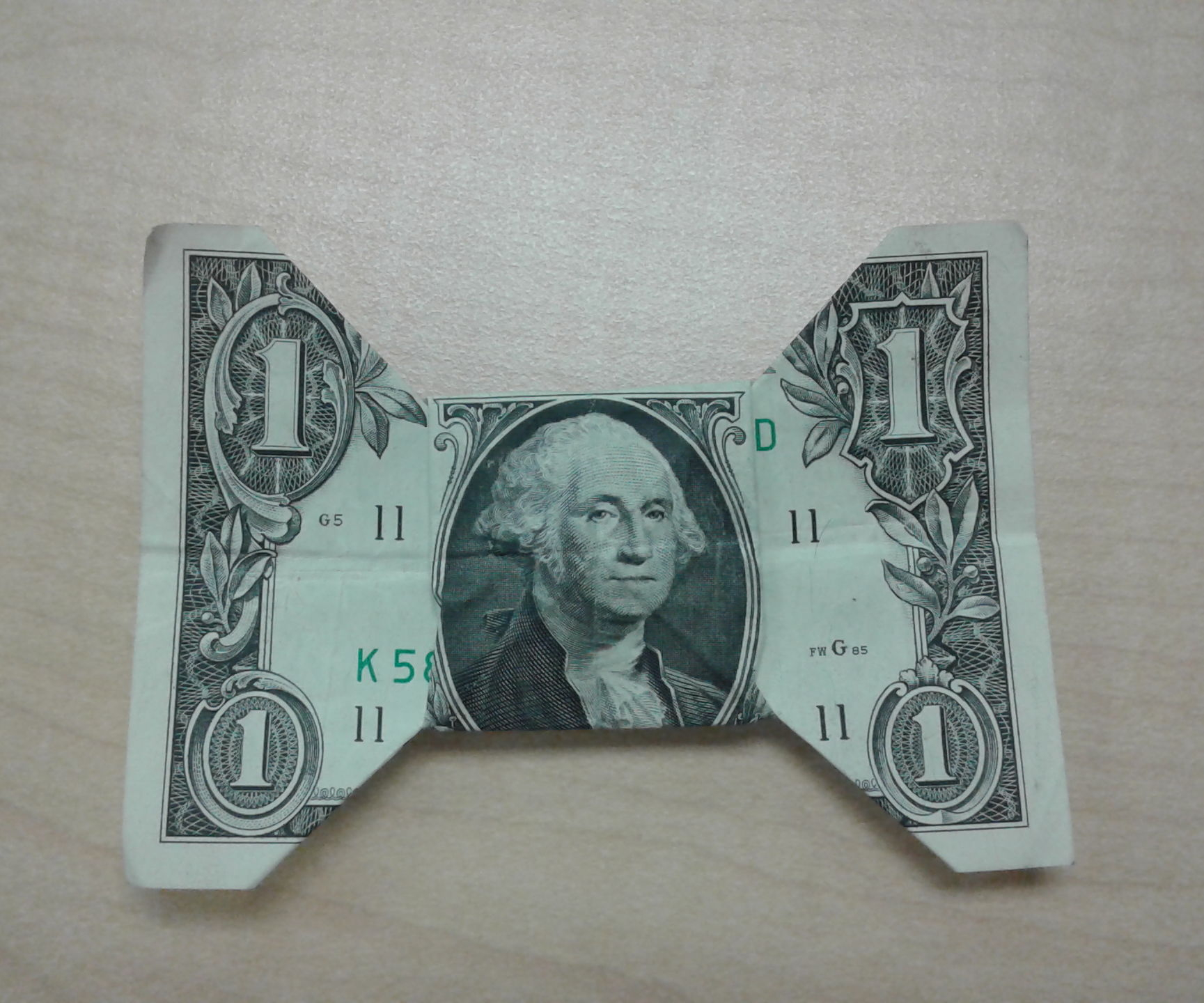 Bow Tie Origami Dollar Bill How To Fold A Dollar Bill Into A Bowtie