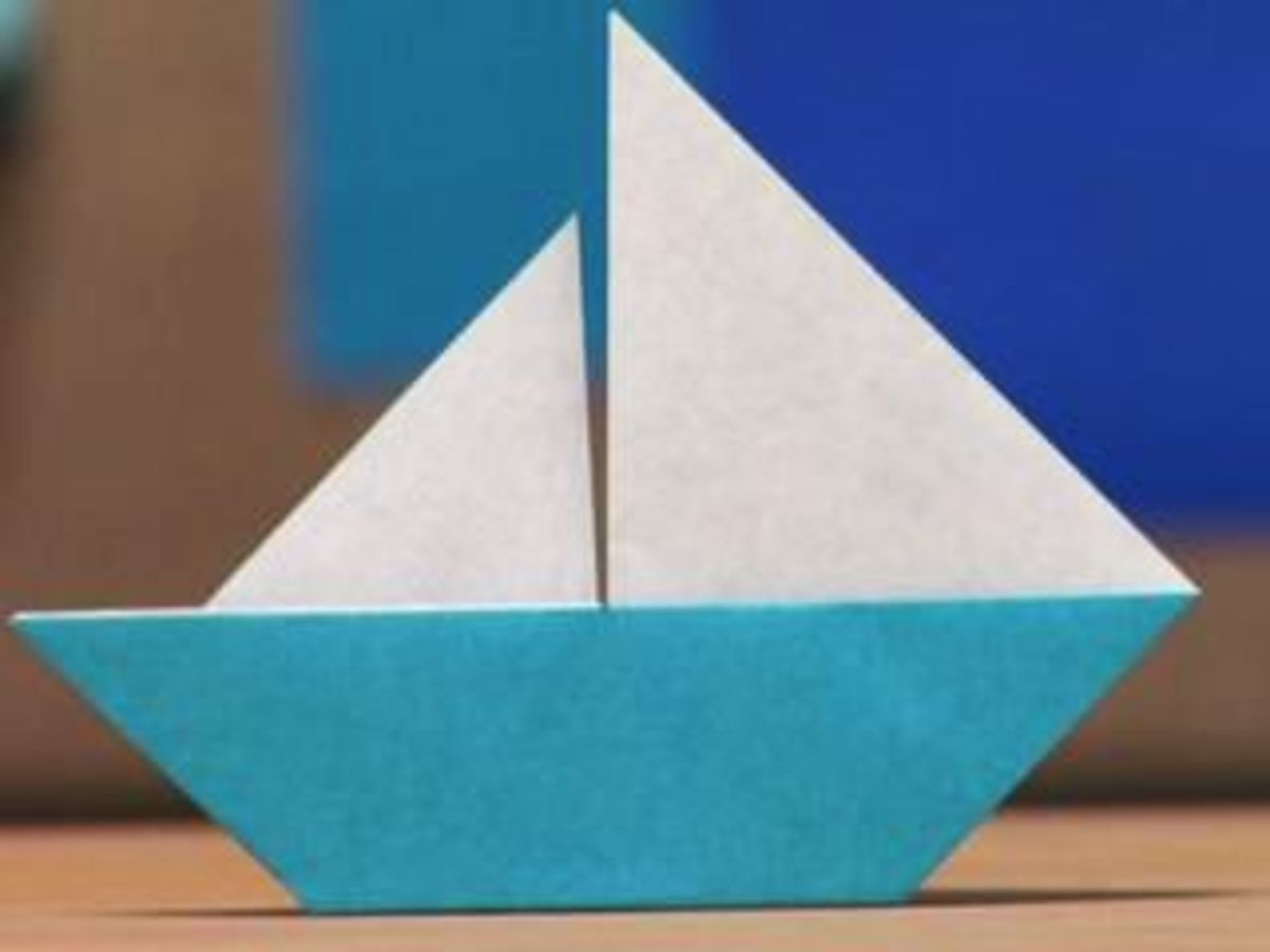 How To Make A Origami Sailboat How To Fold An Origami Sailboat Howcast The Best How To Videos