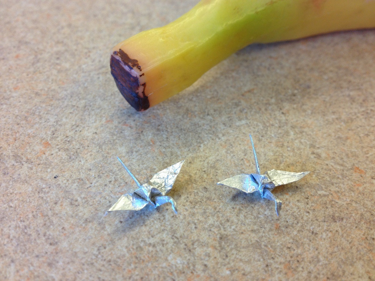 How To Make Origami Swans Tiny Origami Swans Made Out Of Tin Foil Yes Thats A Banana To