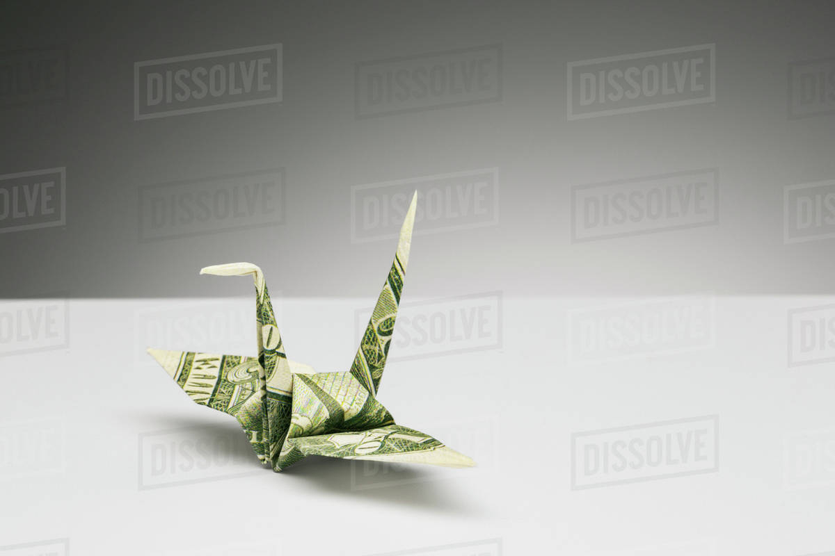 Origami Dollar Bill Origami Crane Made Of Dollar Bill On Counter Stock Photo